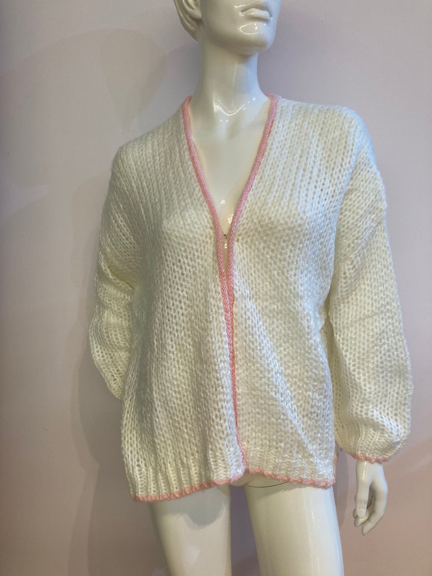 Fluffy white cardigan with pink outline
