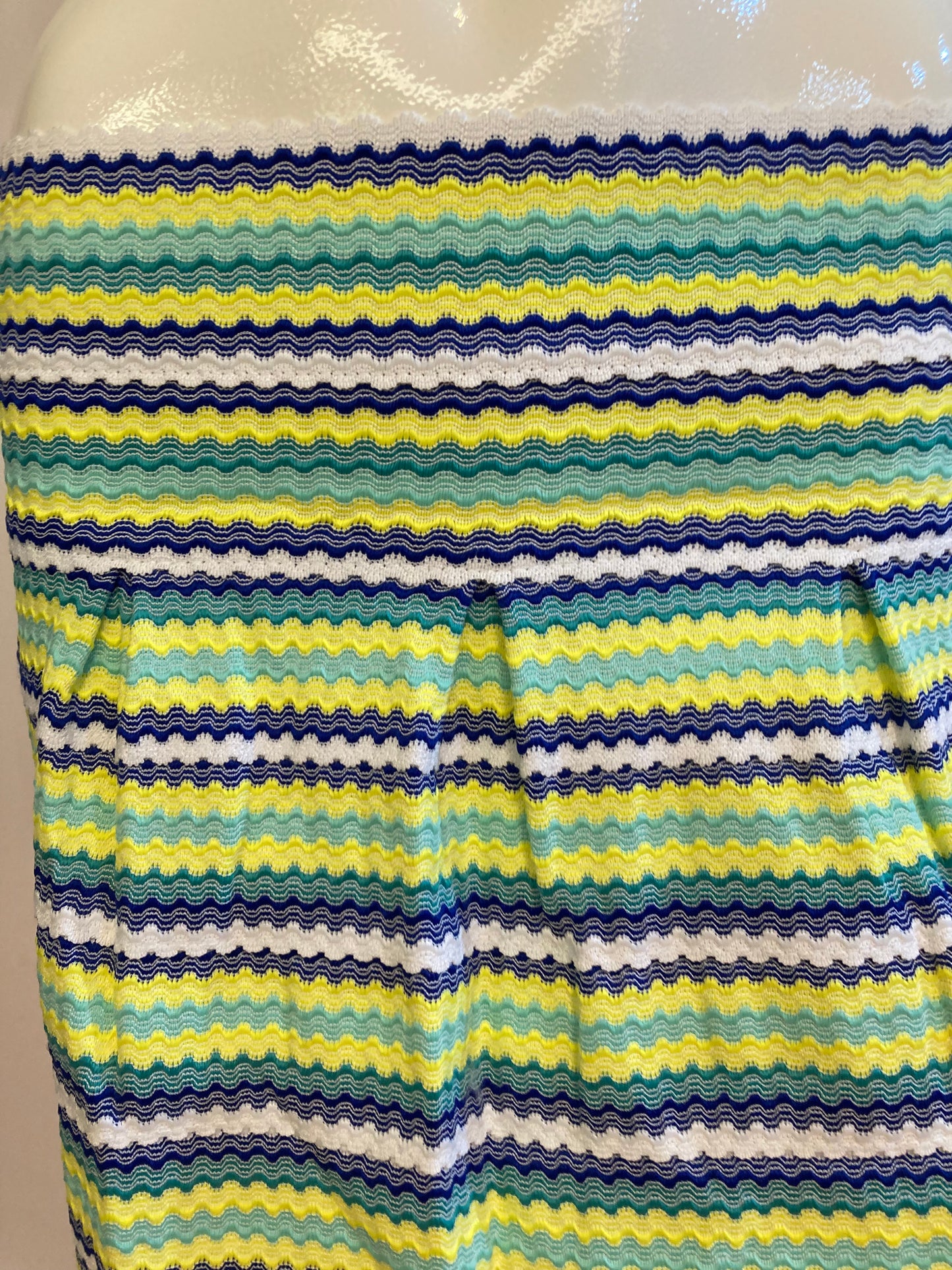 Green striped skirt with pleats and back closure