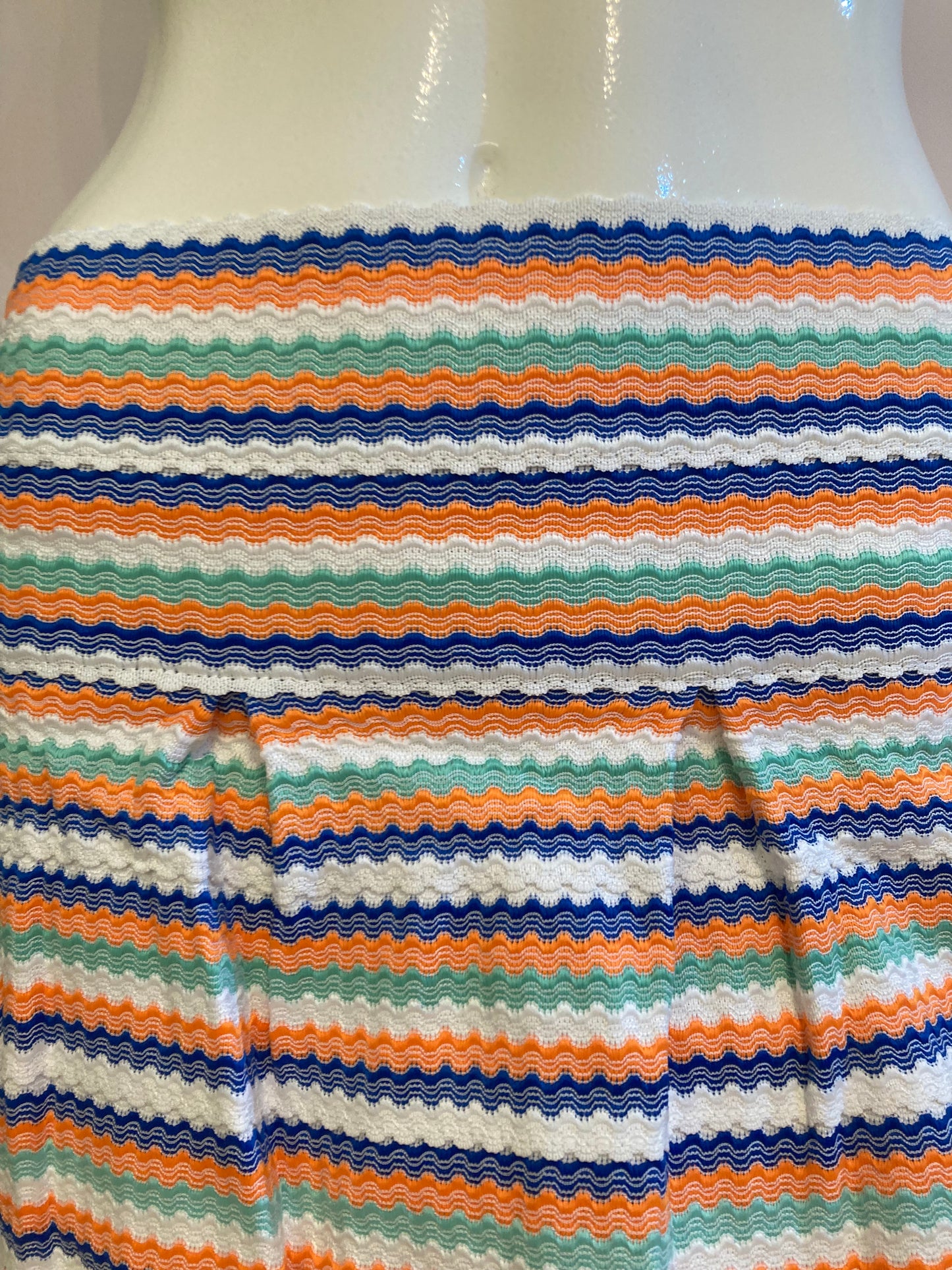 Orange striped skirt with pleats and back closure