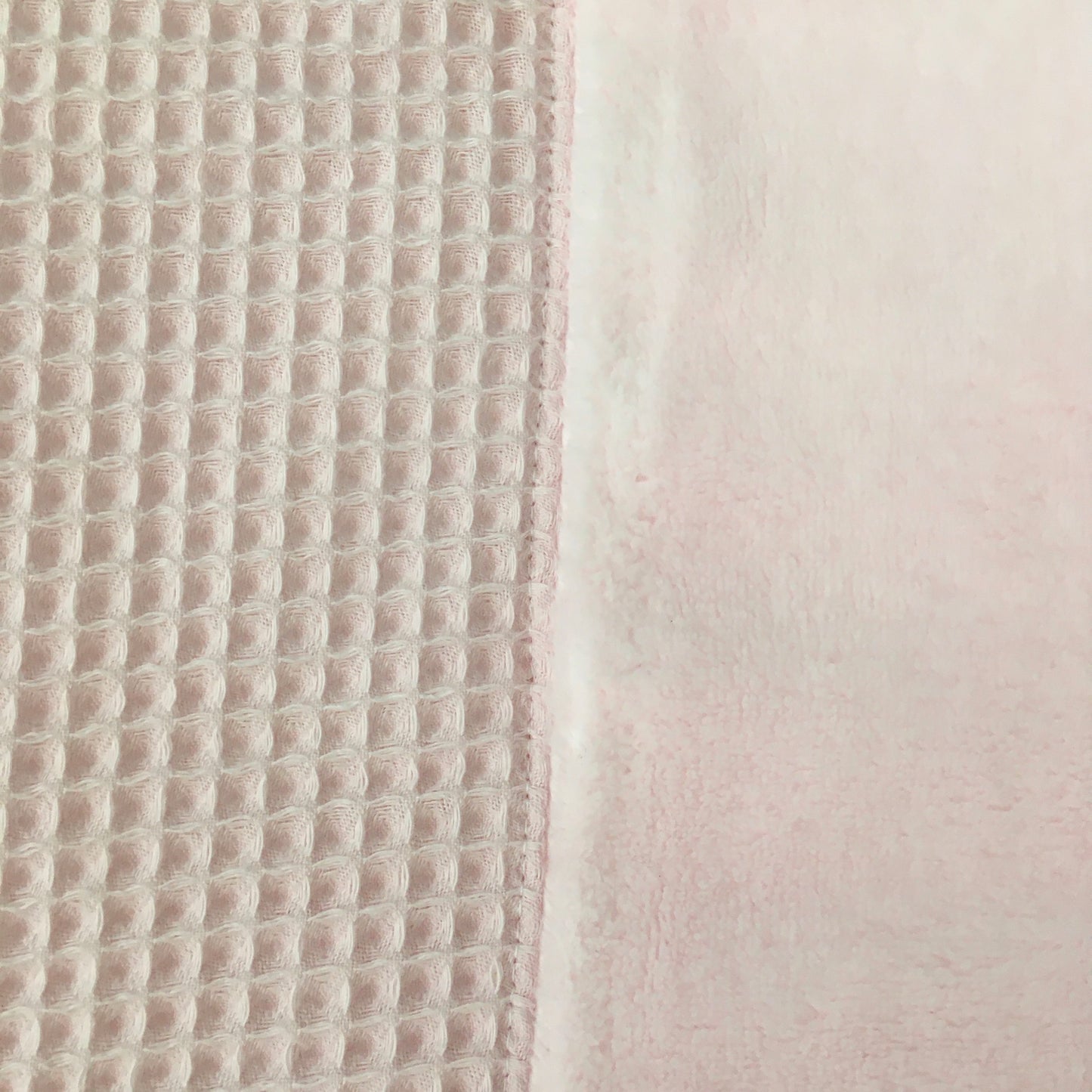 Hoes verzorgingskussen wafel lichtroze /fleece lichtroze