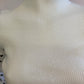 White ribbed sweater with puff sleeves in plumetis tulle