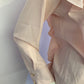Chic pink blouse with long sleeves and ruffles