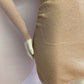 Shiny beige sweater dress with gathered sides