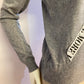 Gray sweater with yoke and rhinestones