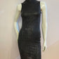 Black cocktail dress with sequins and sleeveless high neck.