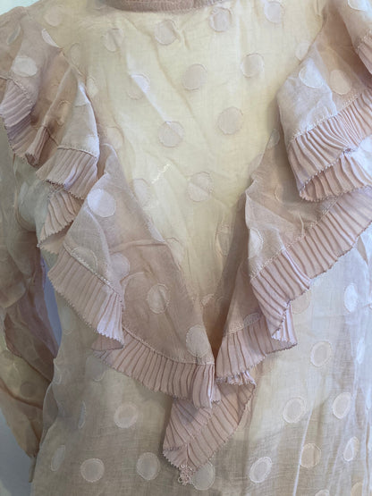 Pink blouse with flounce and peter pan collar