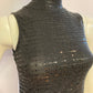 Black cocktail dress with sequins and sleeveless high neck.