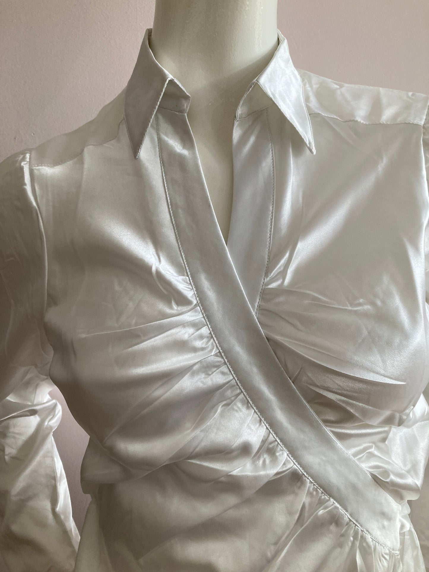 White satin wrap-style blouse