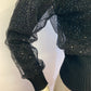 Small ribbed black sweater lined with sequin tulle