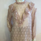 Pink blouse with flounce and peter pan collar