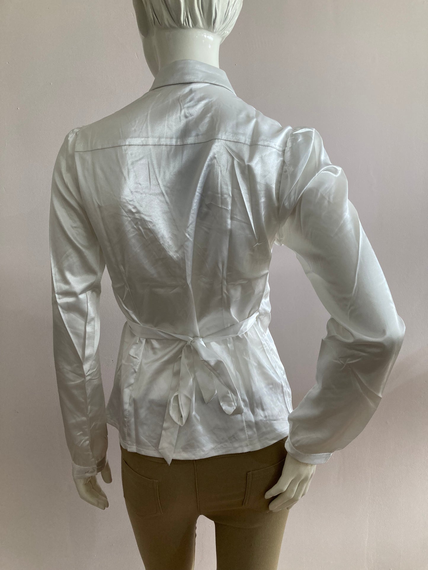 White satin wrap-style blouse