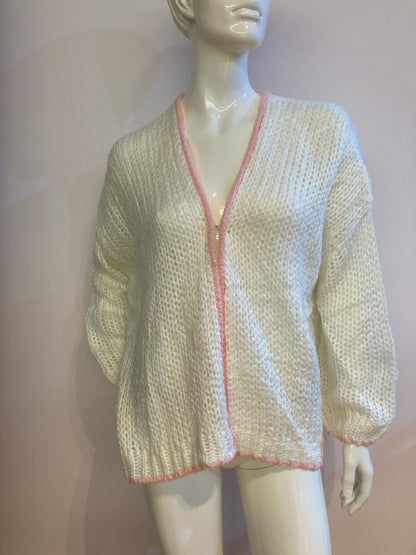 Fluffy white cardigan with pink outline