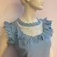 Blue dress with chiffon and lace at bust and collar.