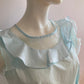 Blue blouse with flounce and tulle