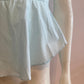 Blue blouse with flounce and tulle