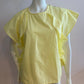 Yellow blouse with ruffle and three buttons on the shoulders