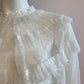 White blouse with plumetis tulle and ruffled
