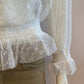 White blouse with plumetis tulle and ruffled