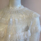 White blouse with plumetis tulle and ruffled