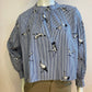 Blue striped blouse with bird motif