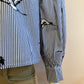 Blue striped blouse with bird motif