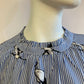 Blue striped blouse with bird motif