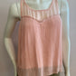 Pink blouse lined and pleated at the front