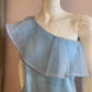 Crossover top with ruffle in turquoise