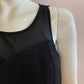 Black blouse lined and pleated at the front