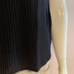 Black blouse lined and pleated at the front