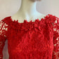 Red boat neck top in pretty lined lace