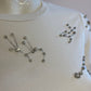 White t-shirt with rhinestones on the bust