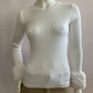 Ribbed sweater with faux fur sleeves