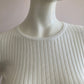 Ribbed sweater with faux fur sleeves