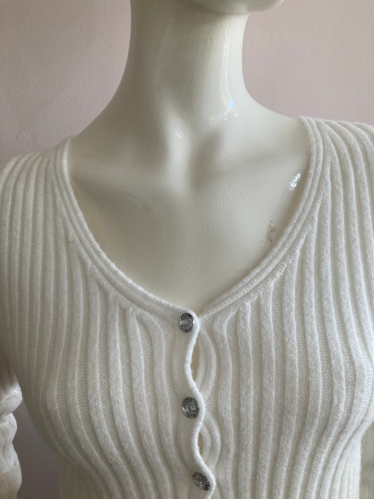 Nice short ribbed white cardigan with shiny buttons