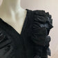 Black frilly blouse