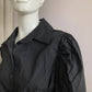 Black shirt with puffed sleeves and integrated belt