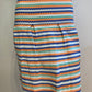 Orange striped skirt with pleats and back closure