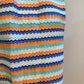 Orange striped skirt with pleats and back closure