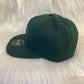 Snapback cap donkergroen