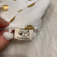 Bandana wit met gouden bollen.