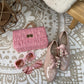 Bag stitching gold and pink details