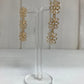 Oorhanger 3 fijne bloemen goud
