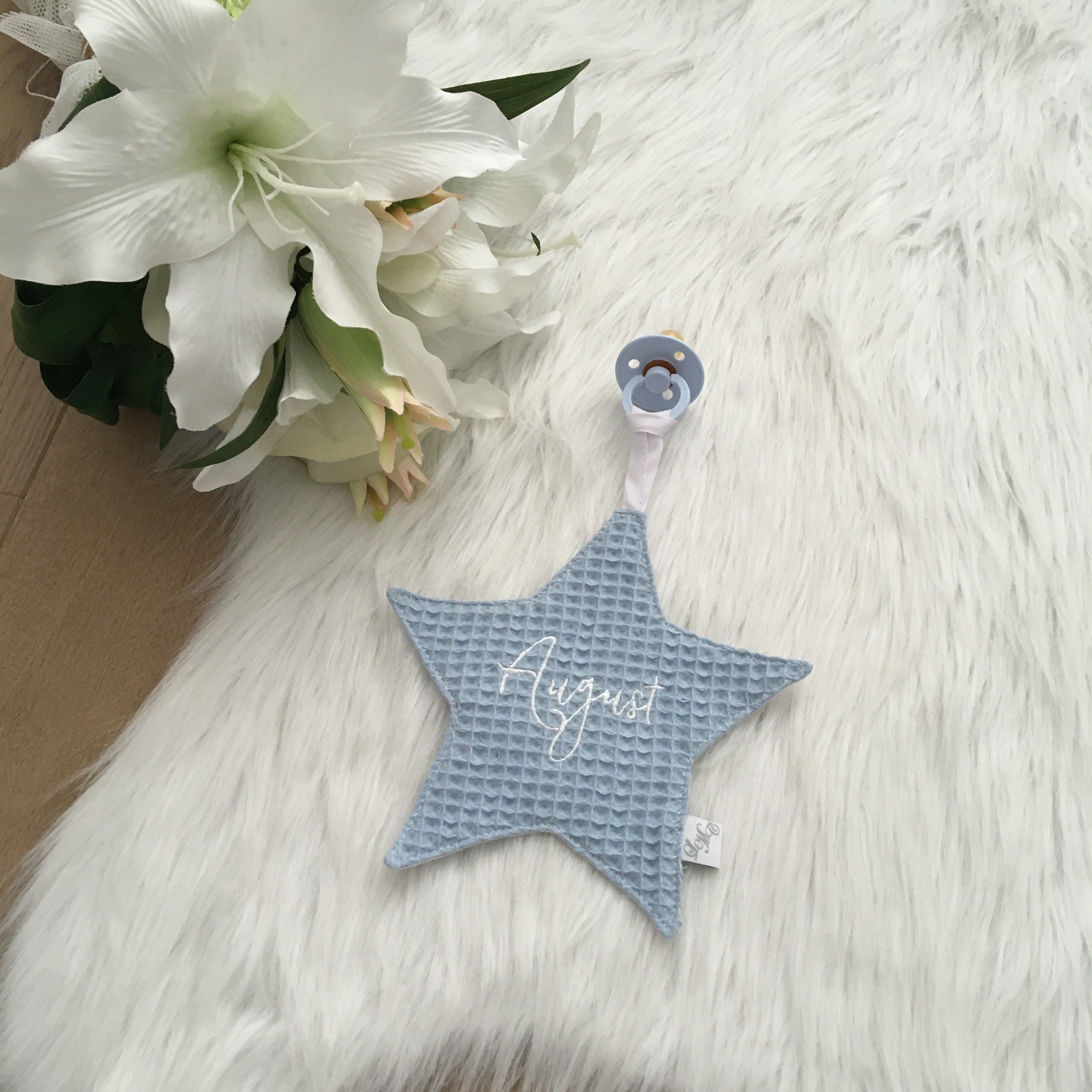 Speendoek ster wafel lichtblauw