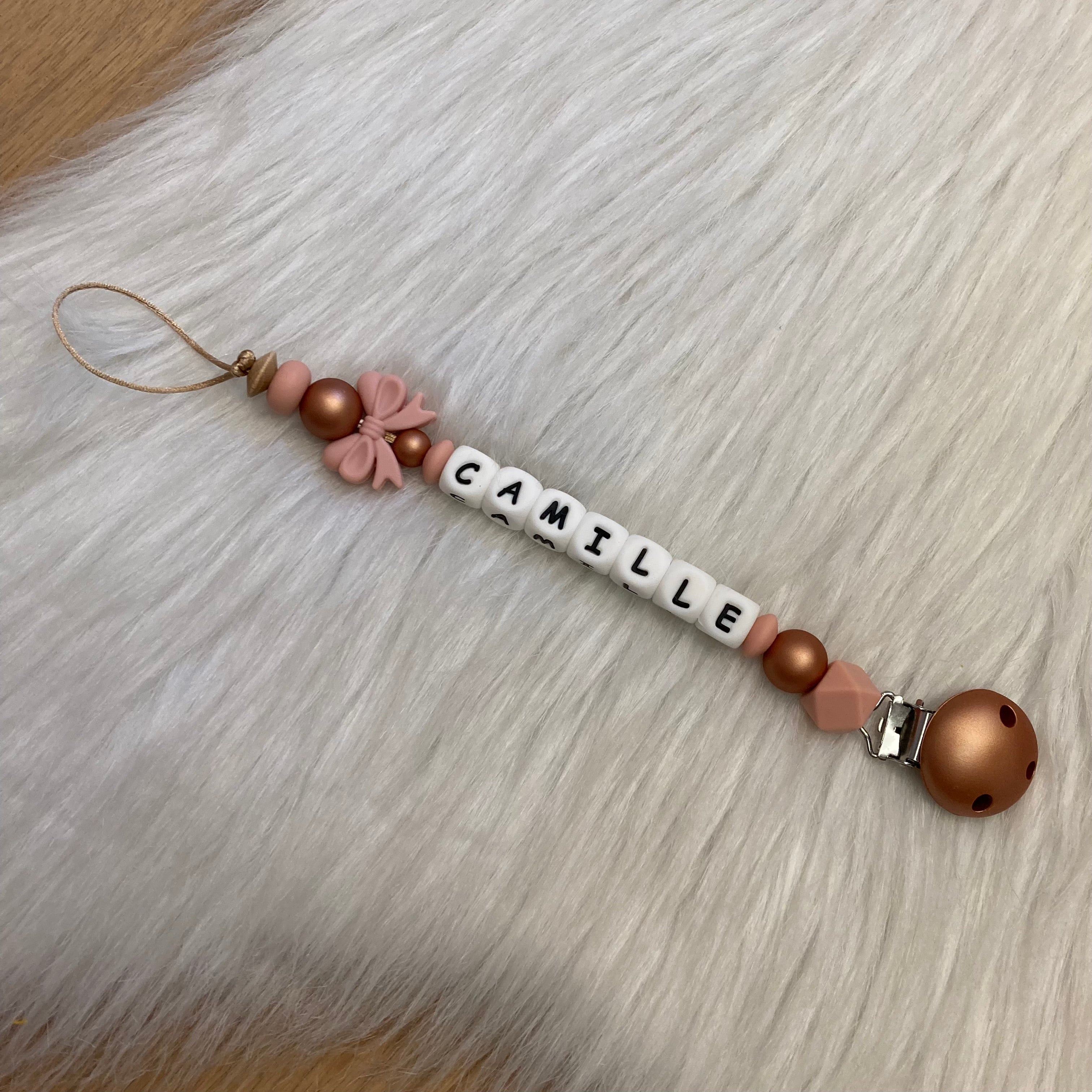 Speenkoord poeder roze strikje roze/koper tinten