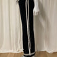 Very flared jogging-style Noir palazzo with bands